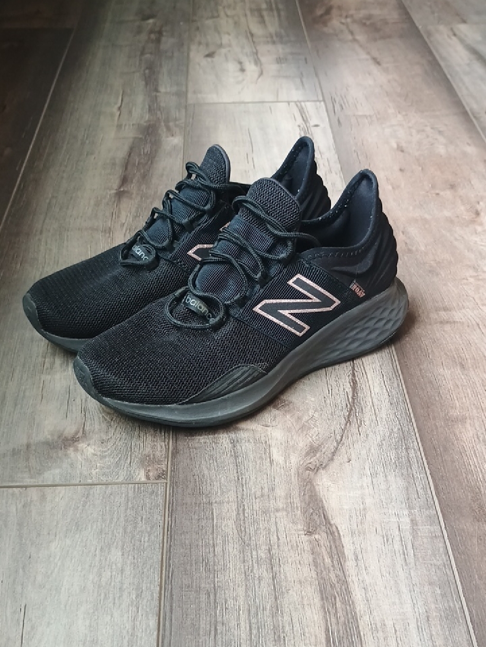 New Balance Black Athletic Sneakers with Metallic Accent
